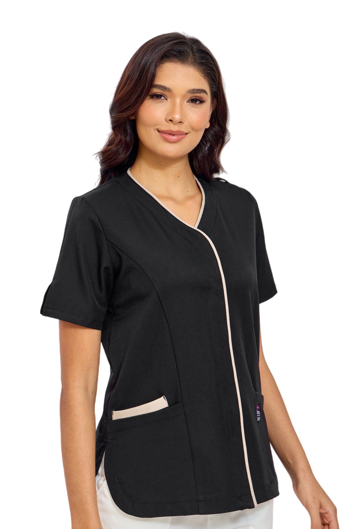 Image d’une blouse médicale femme Serena noire avec pressions dissimulées et finition tan